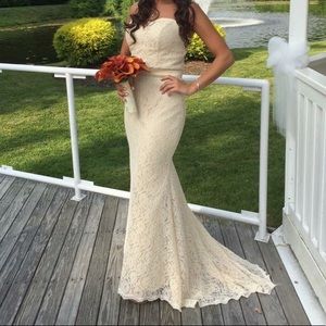 Lace wedding gown w/ Sweetheart top & Bustle dress